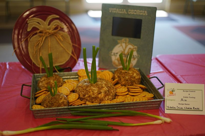 A Vidalia onion dish with crackers and green onions
